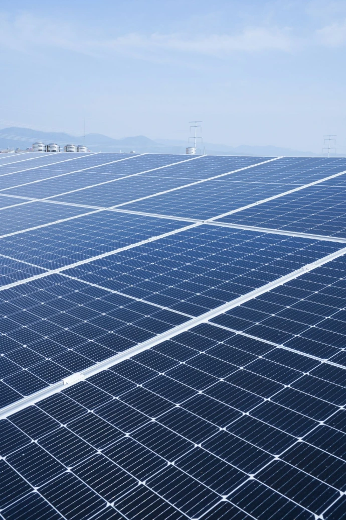 a large solar panel with a sky background